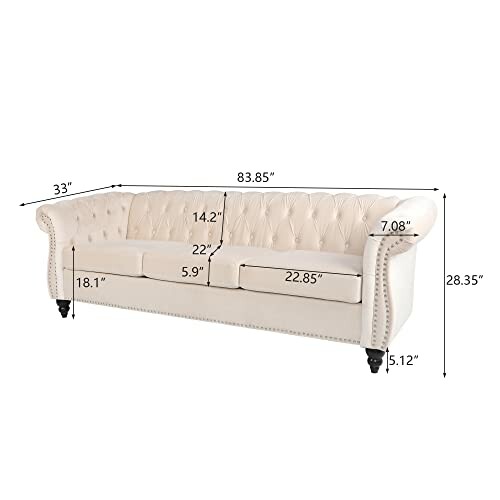 Cream tufted sofa with dimensions labeled.